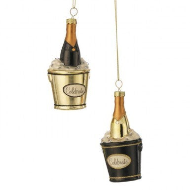 Glass champagne bucket ornaments in gold and black with 'Celebrate' labels and ice detailing.