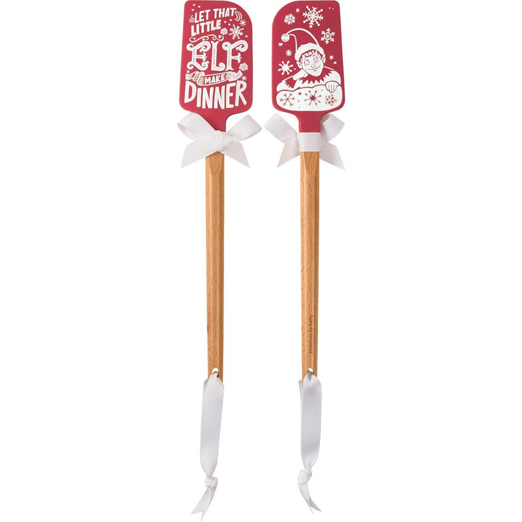Wood-handled silicone spatula with red Christmas-themed blade.