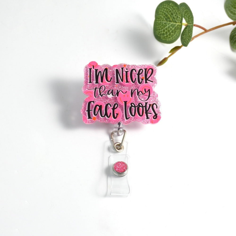 Glitterific Badge Reel featuring a sparkly glitter resin badge with an alligator clip.