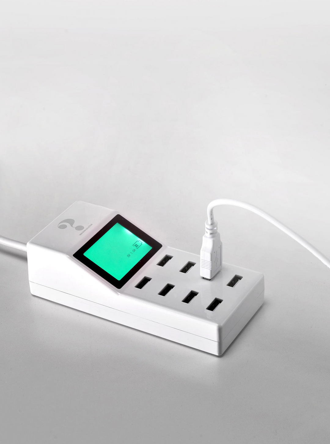 Black USB charging hub with eight ports designed to power professional lamps.