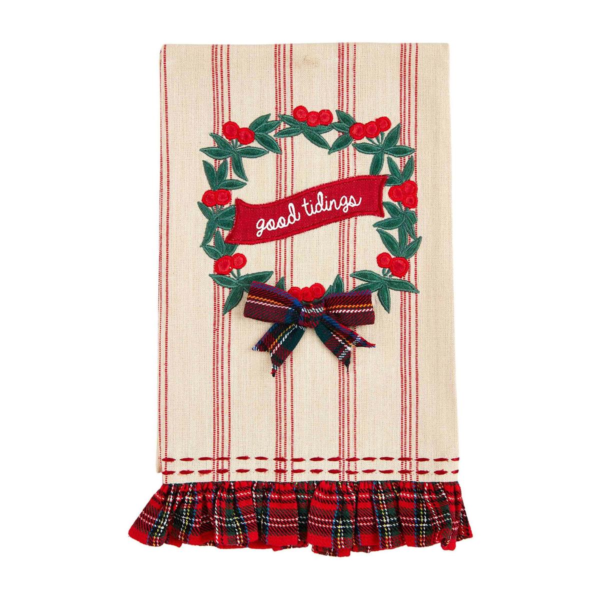 Cotton ruffle towel with velvet applique detailing in a soft neutral tone.
