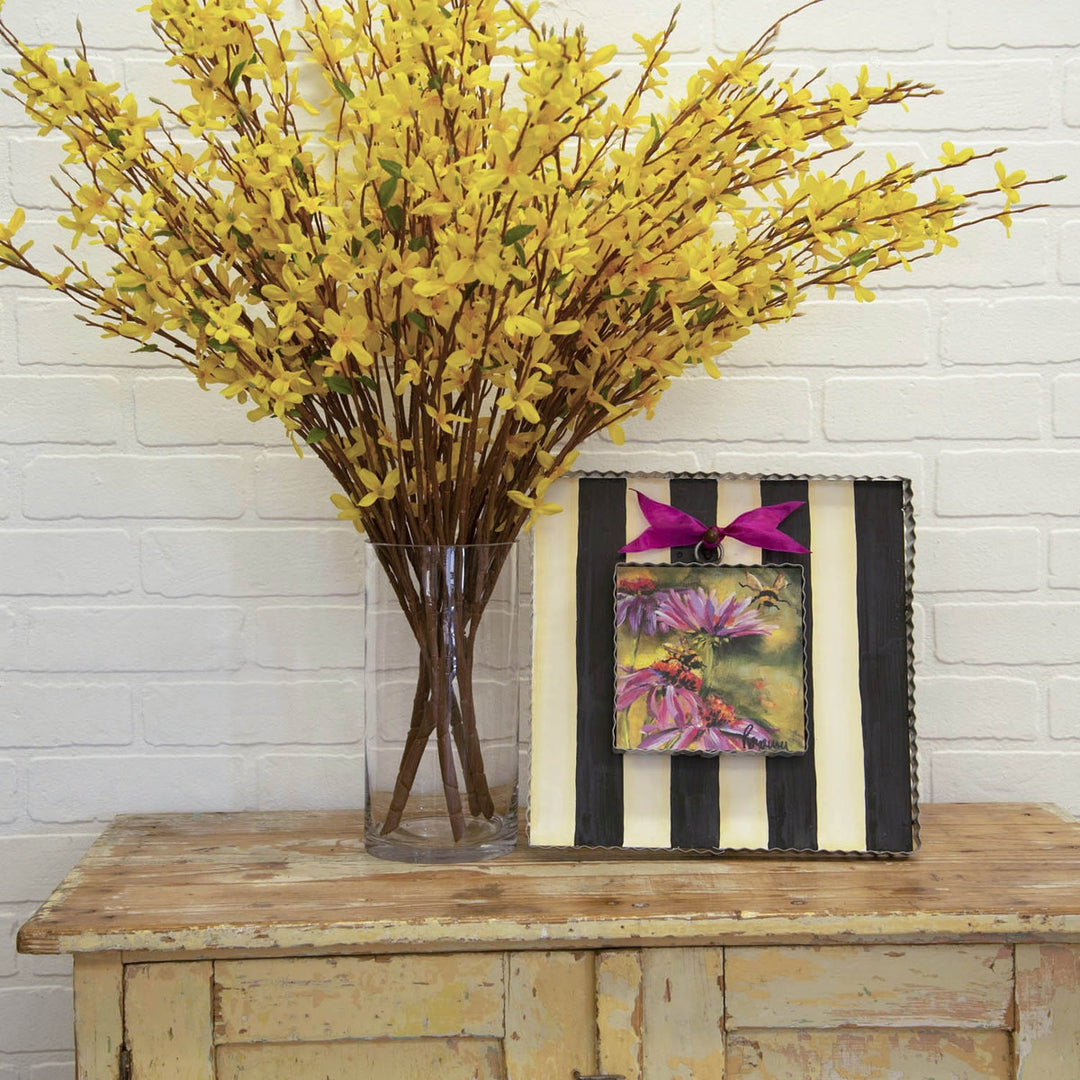 Black and white striped 12x12 inch mini gallery display board on a rustic wooden table.