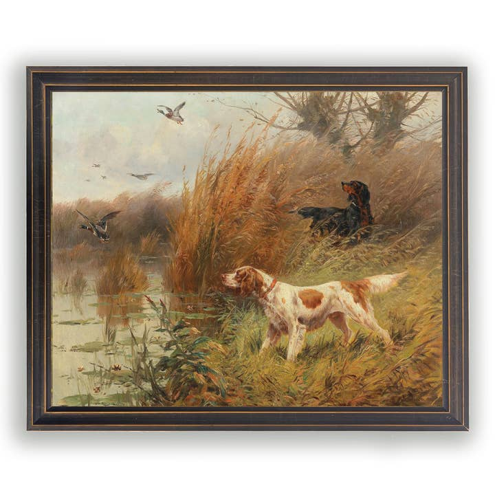 Framed vintage oil painting reproduction of two bird dogs hunting ducks in a marshy landscape.