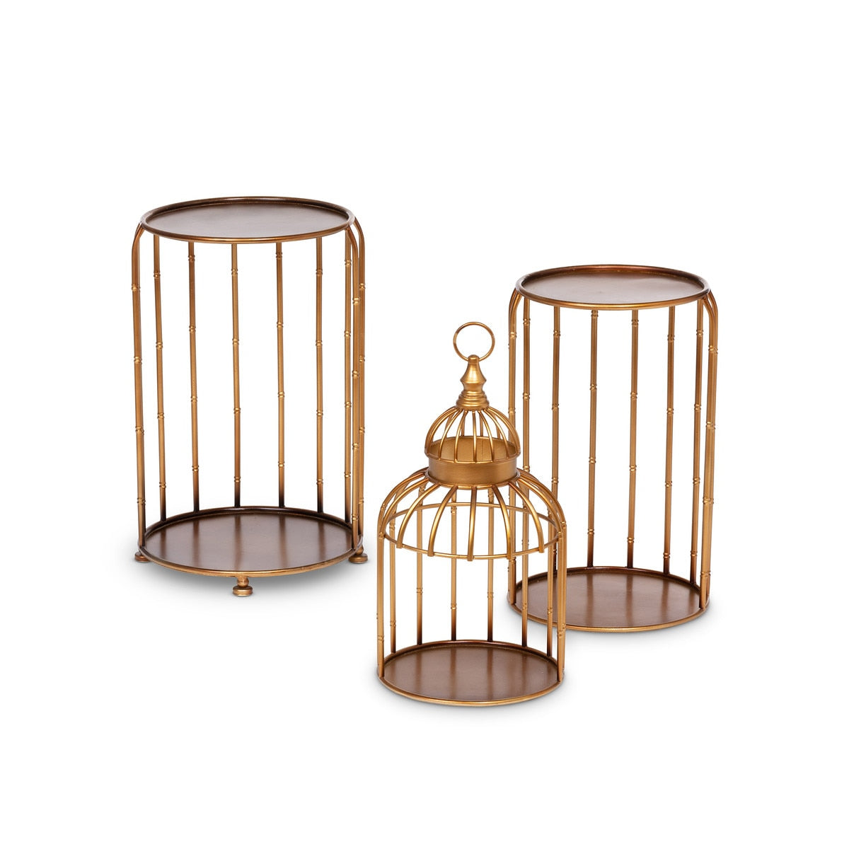 Three golden steel birdcage-style etagere stands in varying heights with a metallic finish.