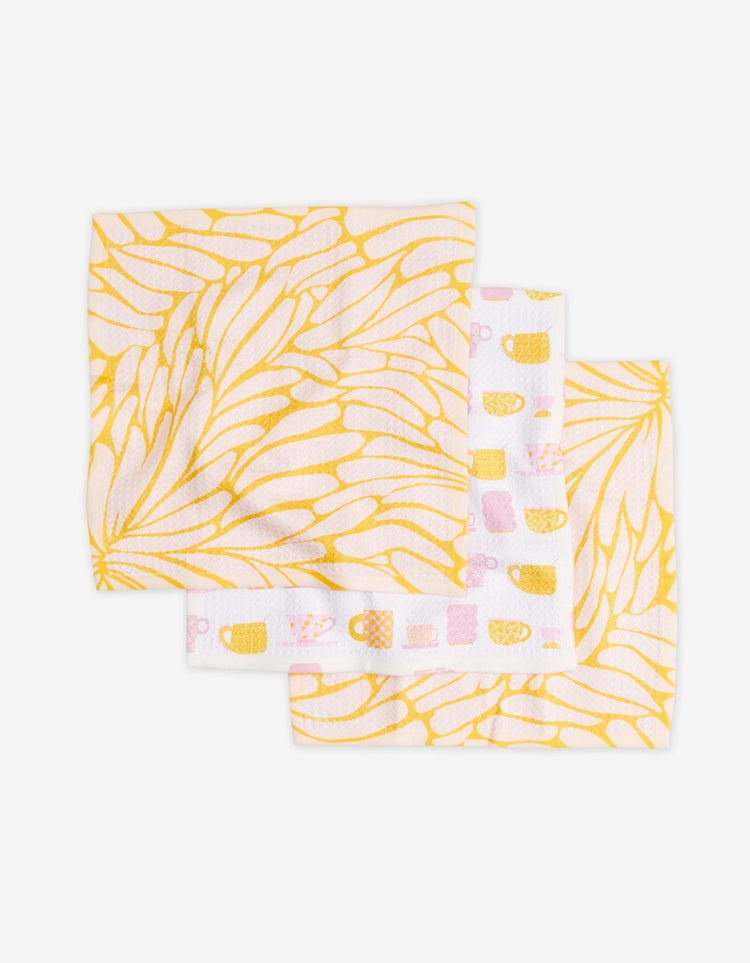 Set of three waffle weave dishcloths in recycled polyester with single-sided prints and hang loops.
