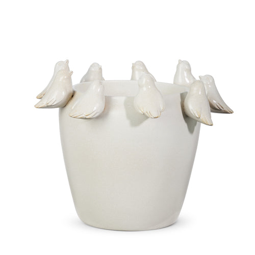 Ten-inch resin bird planter with decorative silhouette