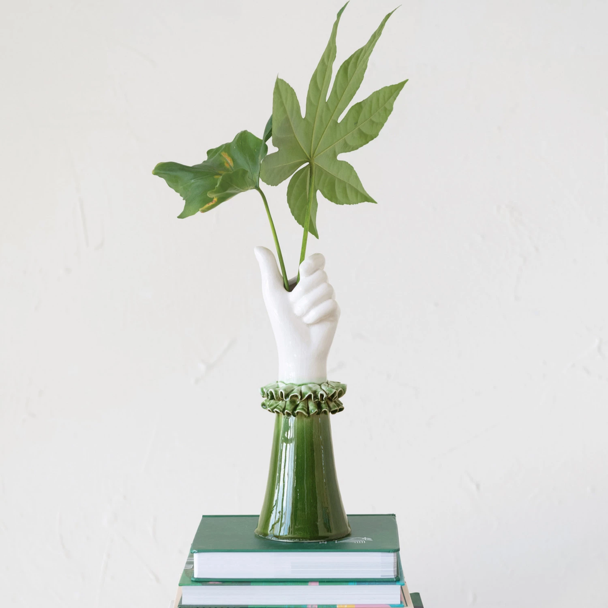 Stoneware hand-shaped vase with ruffled shirt sleeve rim in neutral tone