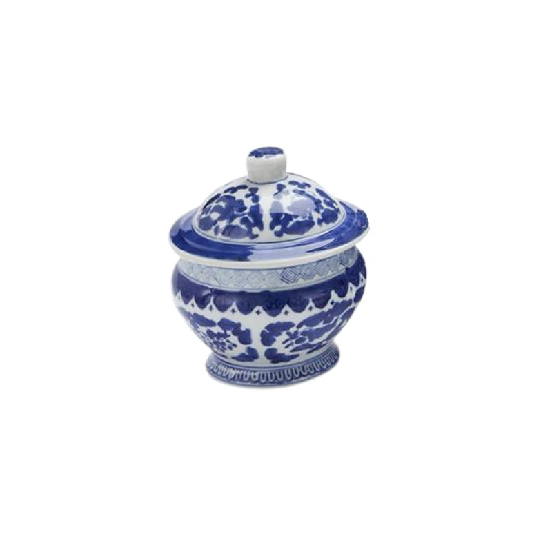 Canton blue and white ceramic lidded jar with traditional floral patterns and a footed base.