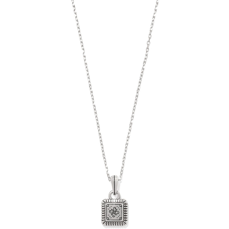 Silver and gold two-tone mini tile necklace with a mosaic pendant on a delicate chain.