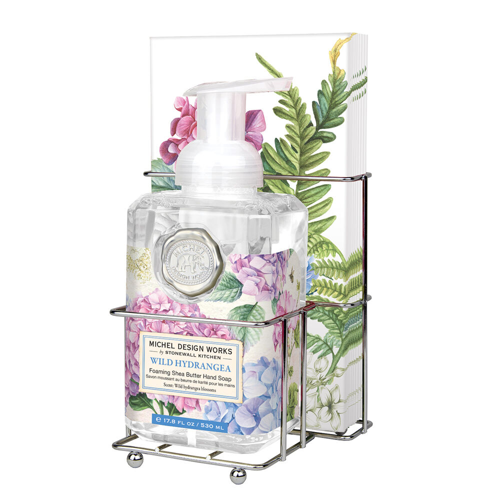 Foaming soap dispenser with matching napkin holder in a compact countertop set