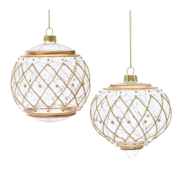 Glittered Harlequin glass ball ornament with a spherical shape featuring red, black, and white geometric patterns.