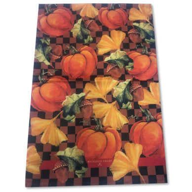 Checked pumpkin harvest printed cotton dish towel with a grid pattern in autumn tones