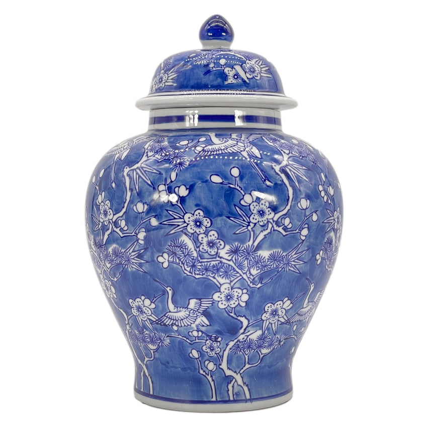 Blue and white ceramic ginger jar with floral crane chinoiserie pattern
