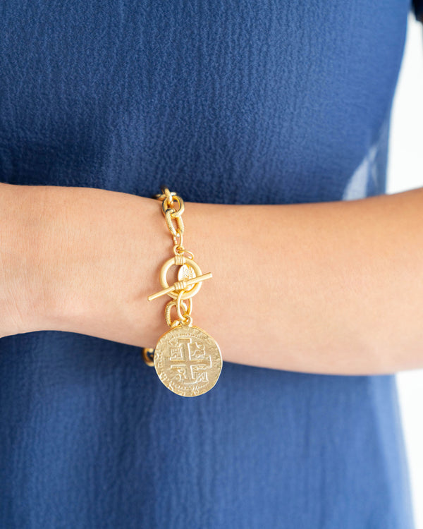 Triple-plated gold Peruvian coin toggle bracelet with textured band