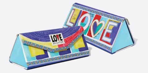 Two triangular Endless Summer sunglass cases with colorful 'LOVE' artwork and Brighton logo.