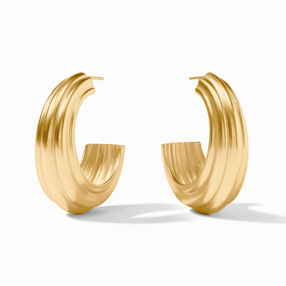 Gold-tone Portofino statement hoop earring with a textured surface.