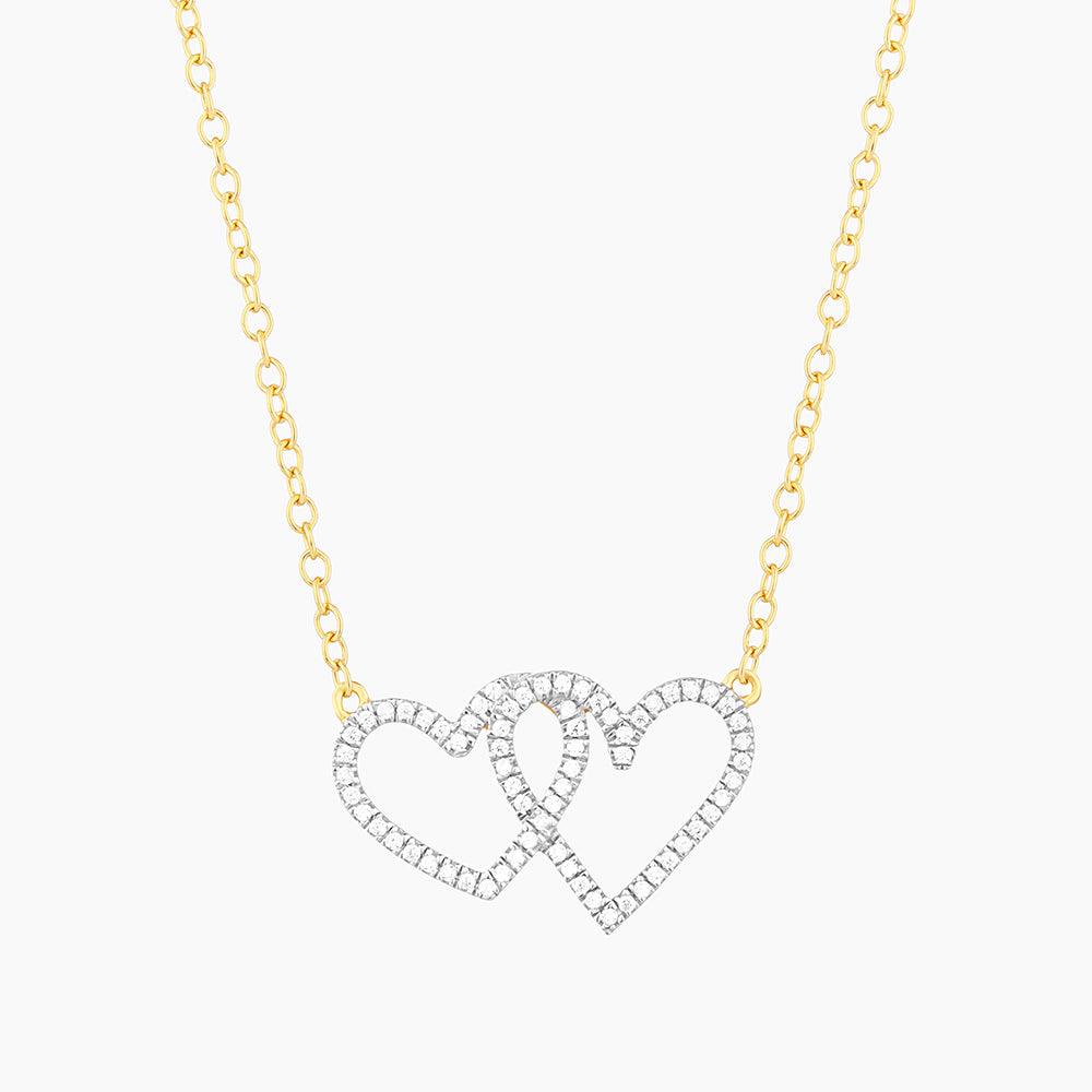Silver-toned Two Hearts Pendant Necklace on a chain with small and large heart charms.