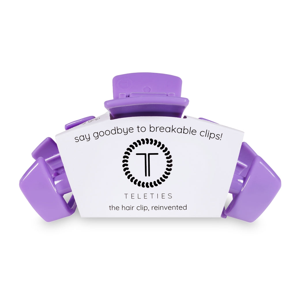 Large purple Teleties hair clip on a white display card.