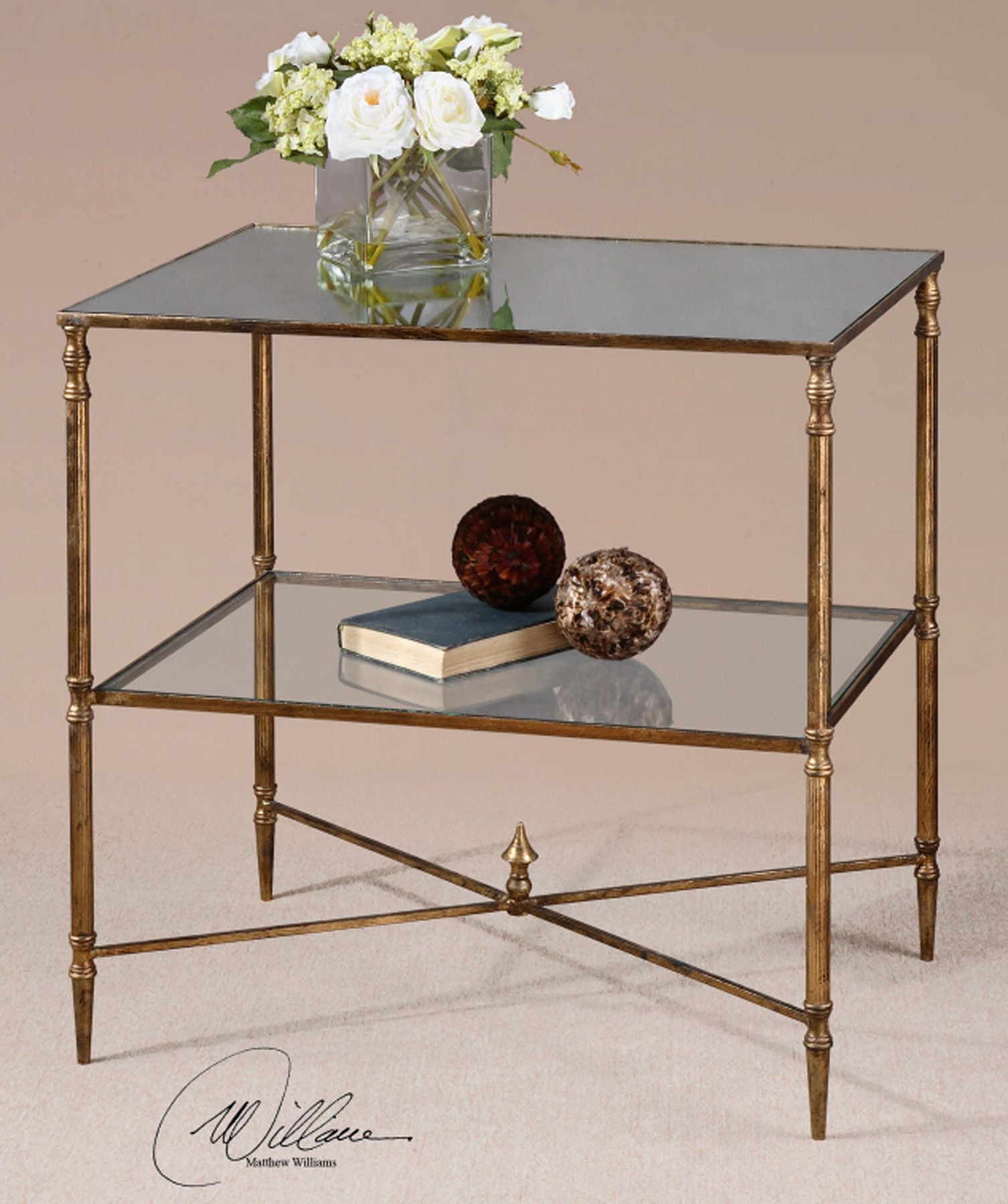 Henzler mirrored glass lamp table with a rectangular silver frame and reflective surface.