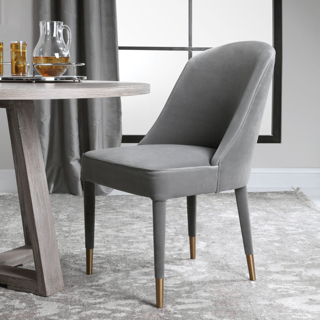 Gray Brie armless chair with curved wooden legs