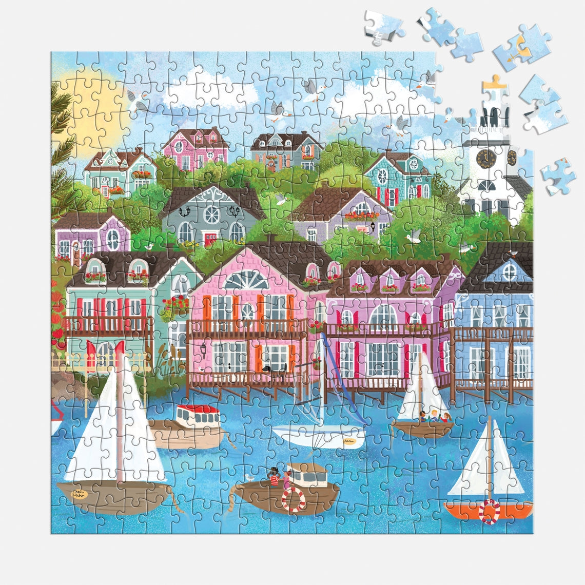 Joy Laforme Harbor By the Sea puzzle featuring a coastal harbor scene with boats on water.