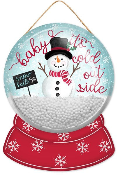 Glitter snow globe dome sign featuring a snowman and the text Baby It's Cold Outside.