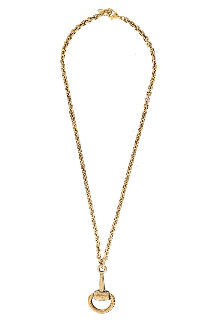 Nova gold-tone chain necklace featuring an equestrian-inspired bit hardware pendant.