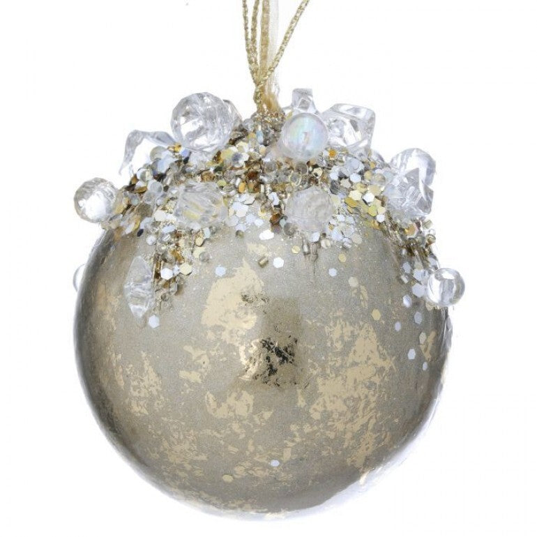 4-inch round gold Christmas ornament decorated with clear jewels and glitter on the top half.