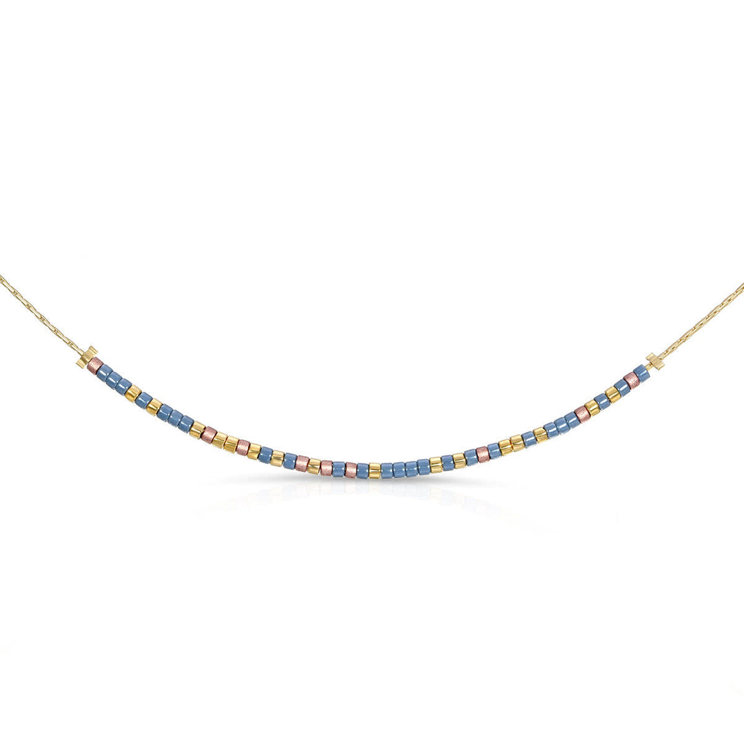 Best Teacher Ever morse code necklace with blue, pink, and gold beads on a gold chain.