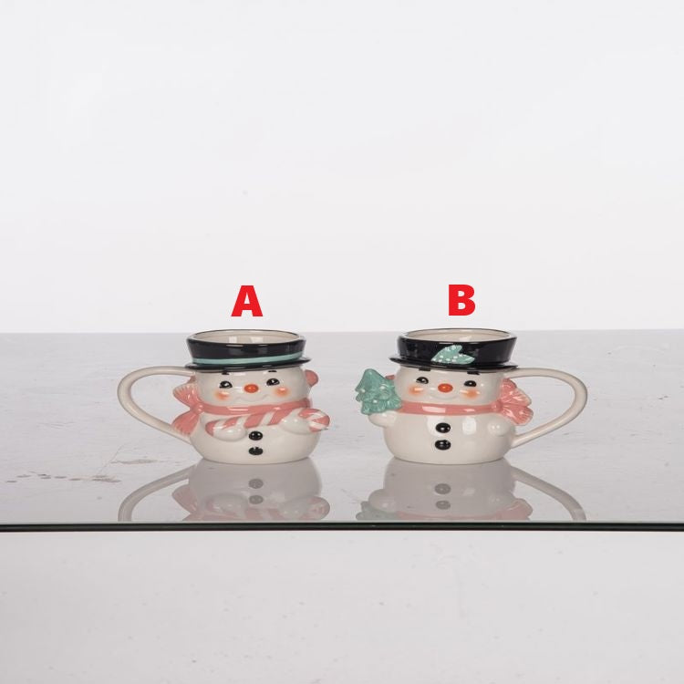 Pink vintage-style ceramic mug featuring a snowman illustration with dimensions 6 inches long by 4 inches wide.