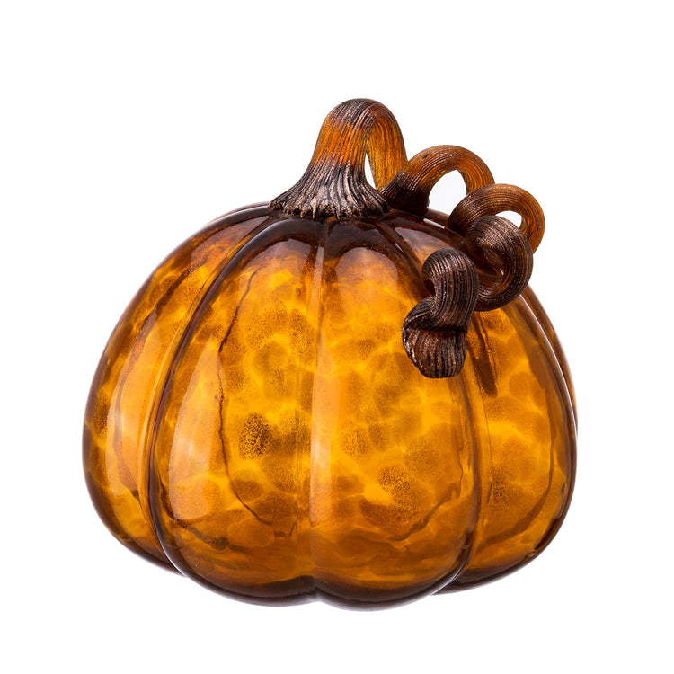 Amber Halloween pumpkin with a carved jack-o'-lantern face on an orange background.