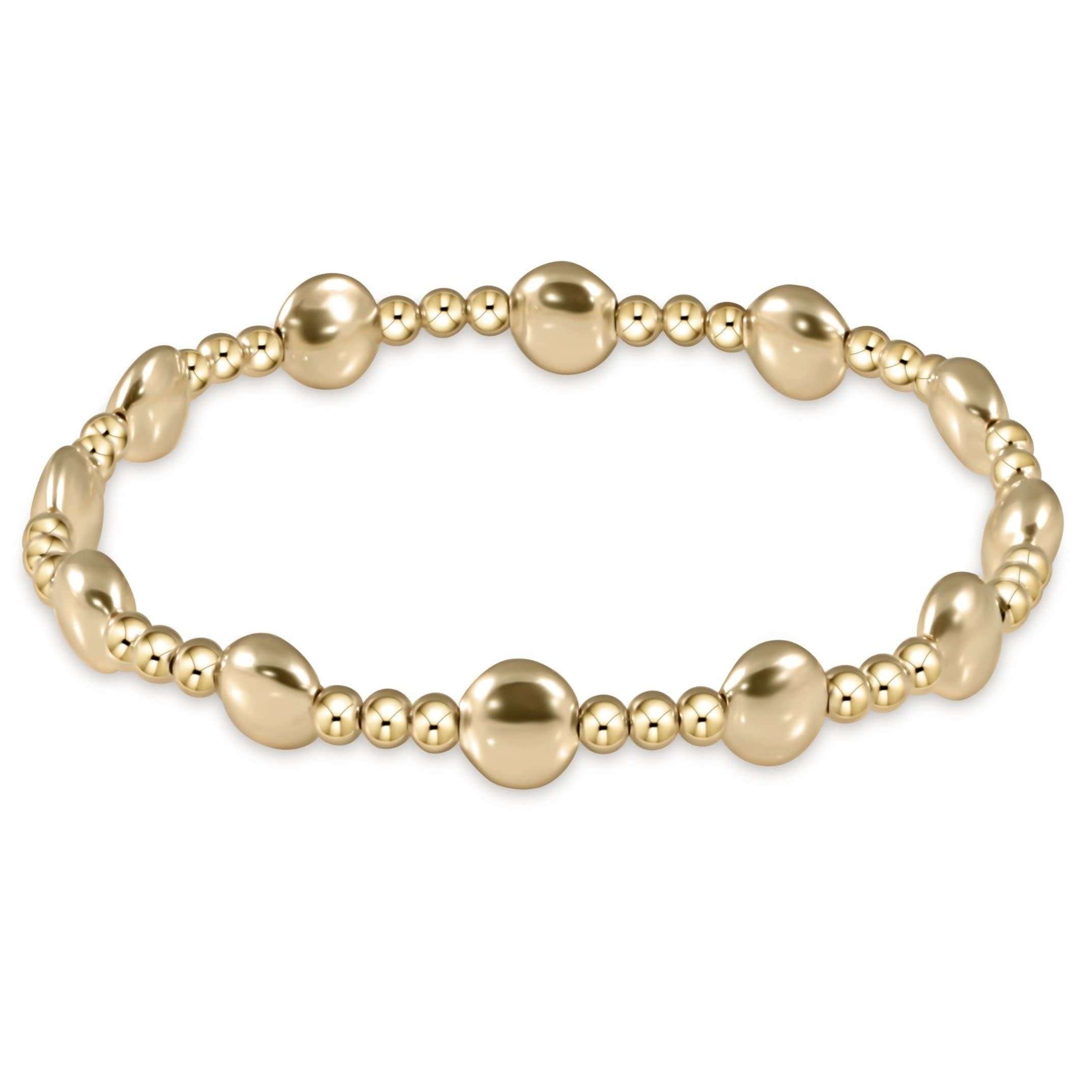 Honesty Gold Sincerity Pattern 6mm Bead Bracelet with 14kt gold-filled beads on elastic.