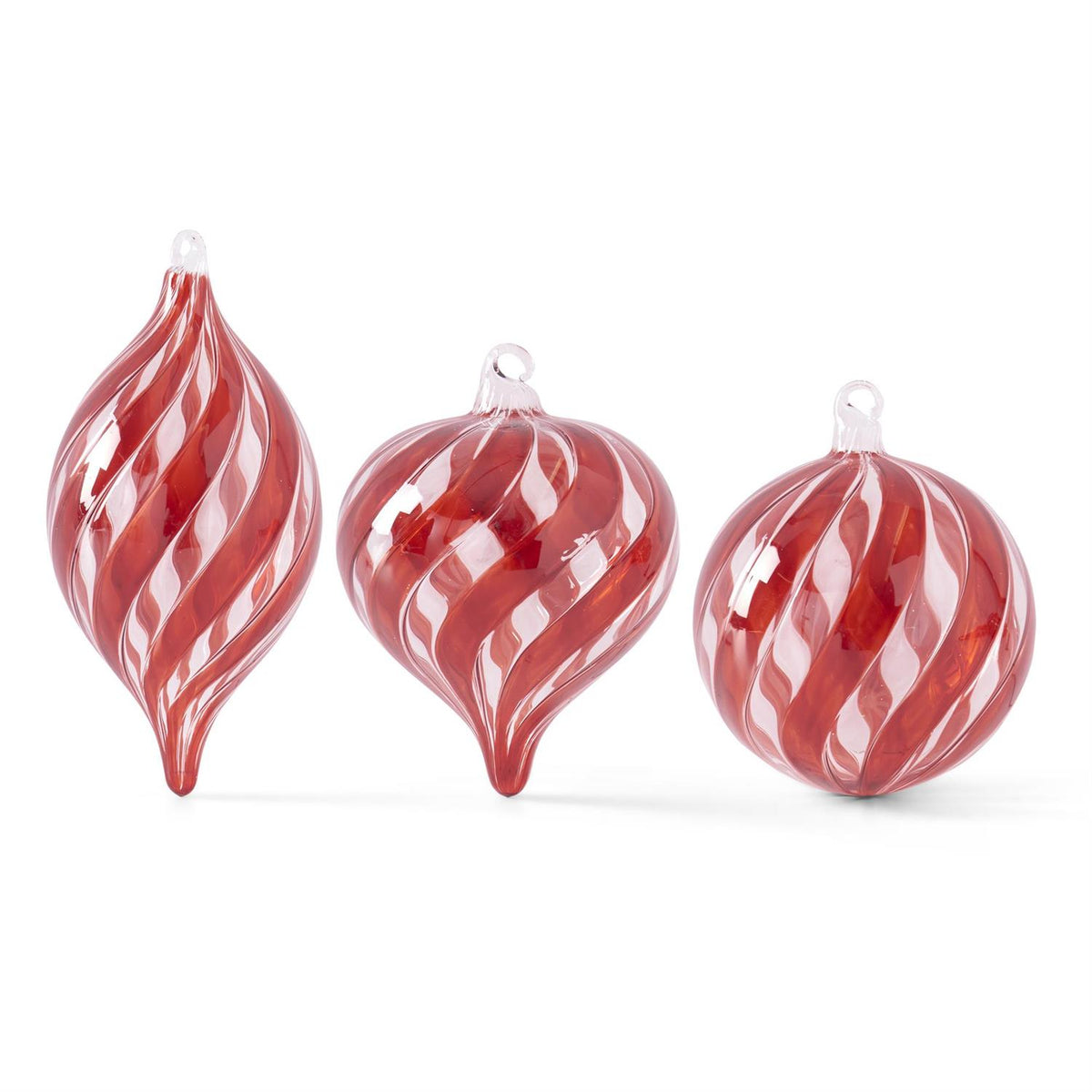 Red and clear glass ornaments with a swirled pattern