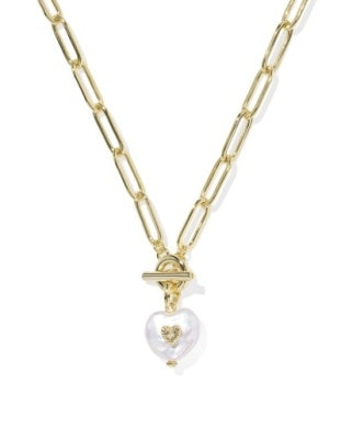 Gold paperclip chain necklace with a toggle clasp and a white heart-shaped pearl pendant.