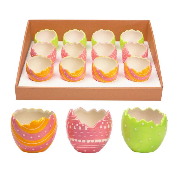 Mini ceramic Easter egg planter in pastel yellow with subtle speckled pattern.