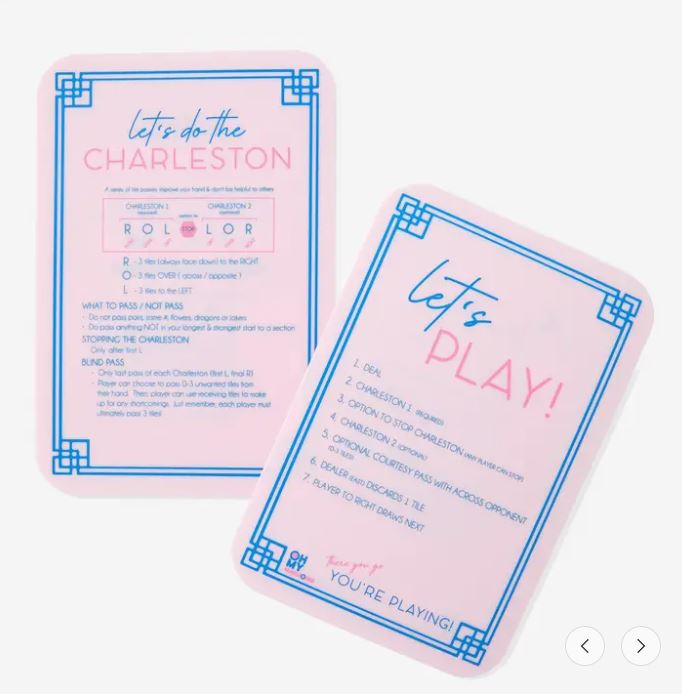 Light pink Mahjong tile shuffler with printed rules on sides