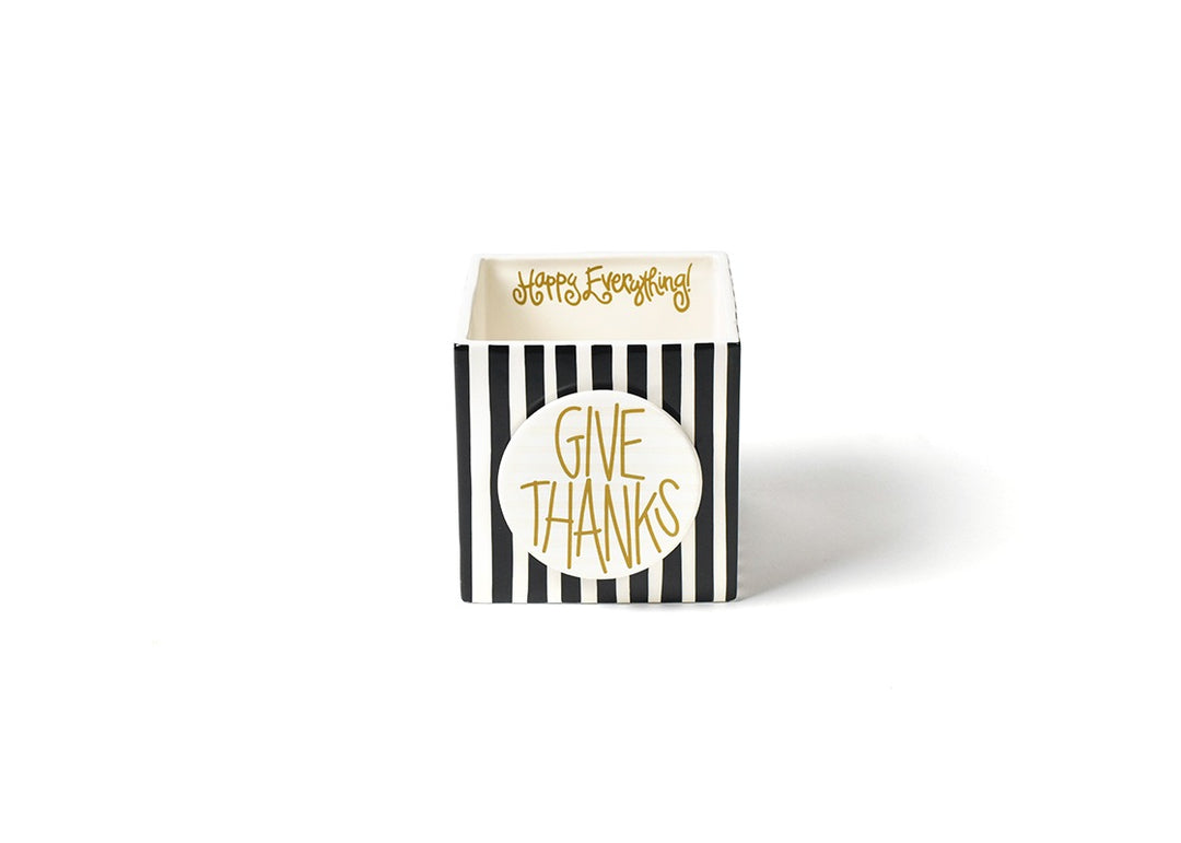 Black and white striped ceramic nesting cube with a gold 'Give Thanks' attachment.