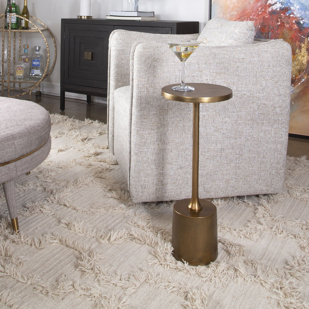Sanaga Drink Table in Gold finish with a rectangular tabletop measuring 10 inches wide by 10 inches deep and standing 25 inches high.