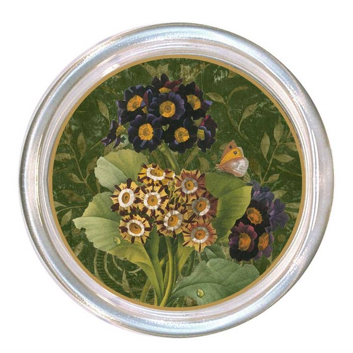 Glass coaster with a high rim and black velvet back.