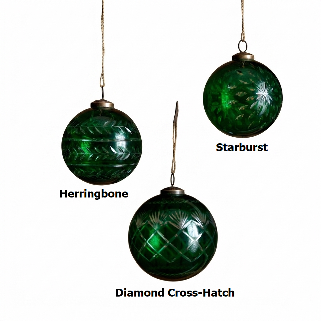 Three green cut glass 4-inch ball ornaments in Herringbone, Starburst, and Diamond Cross-Hatch.