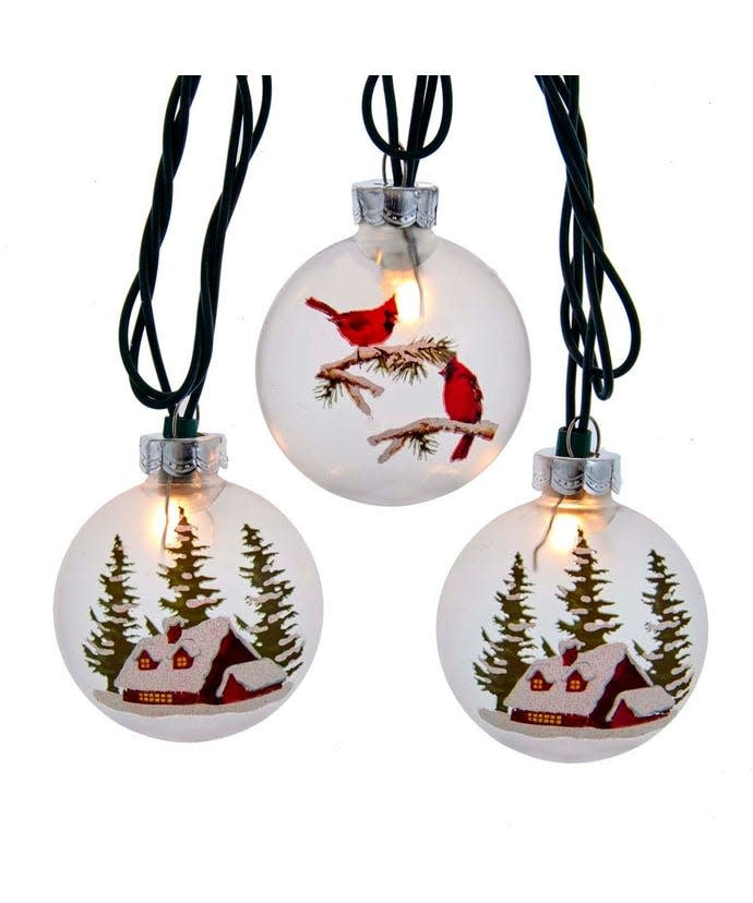 Ten-light UL disc light set with green wire featuring cardinal and cabin patterns.
