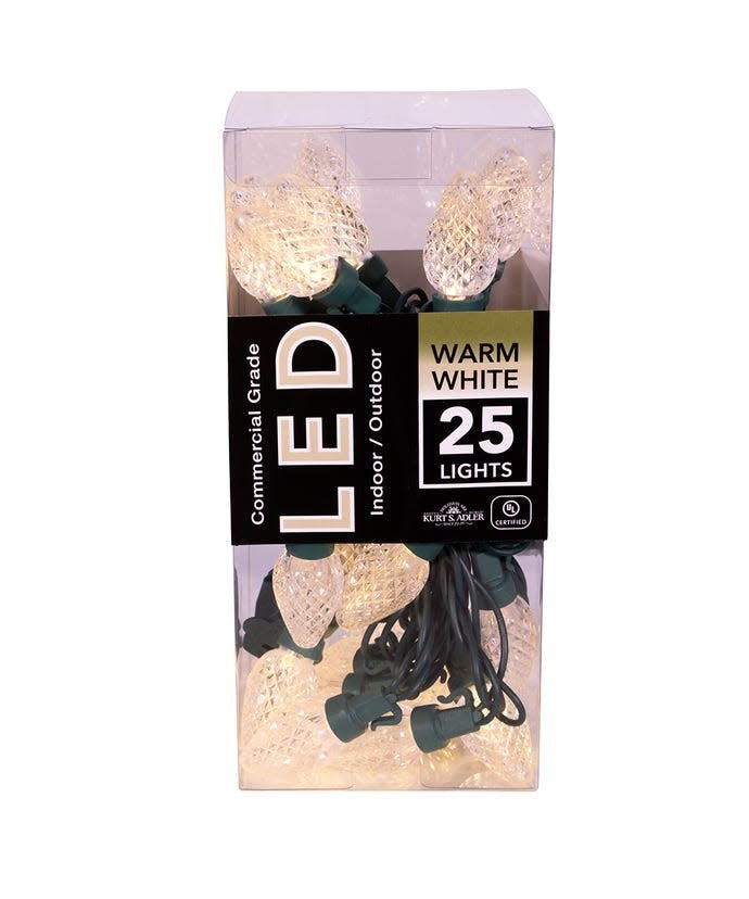 Set of twenty-five warm white faceted C7 LED lights with green wire leads and I-Mold construction.