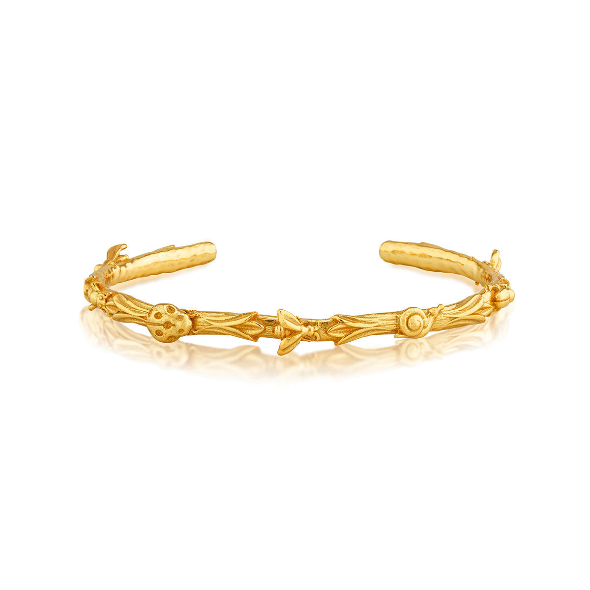 Petite gold cuff bracelet with an open oval link design
