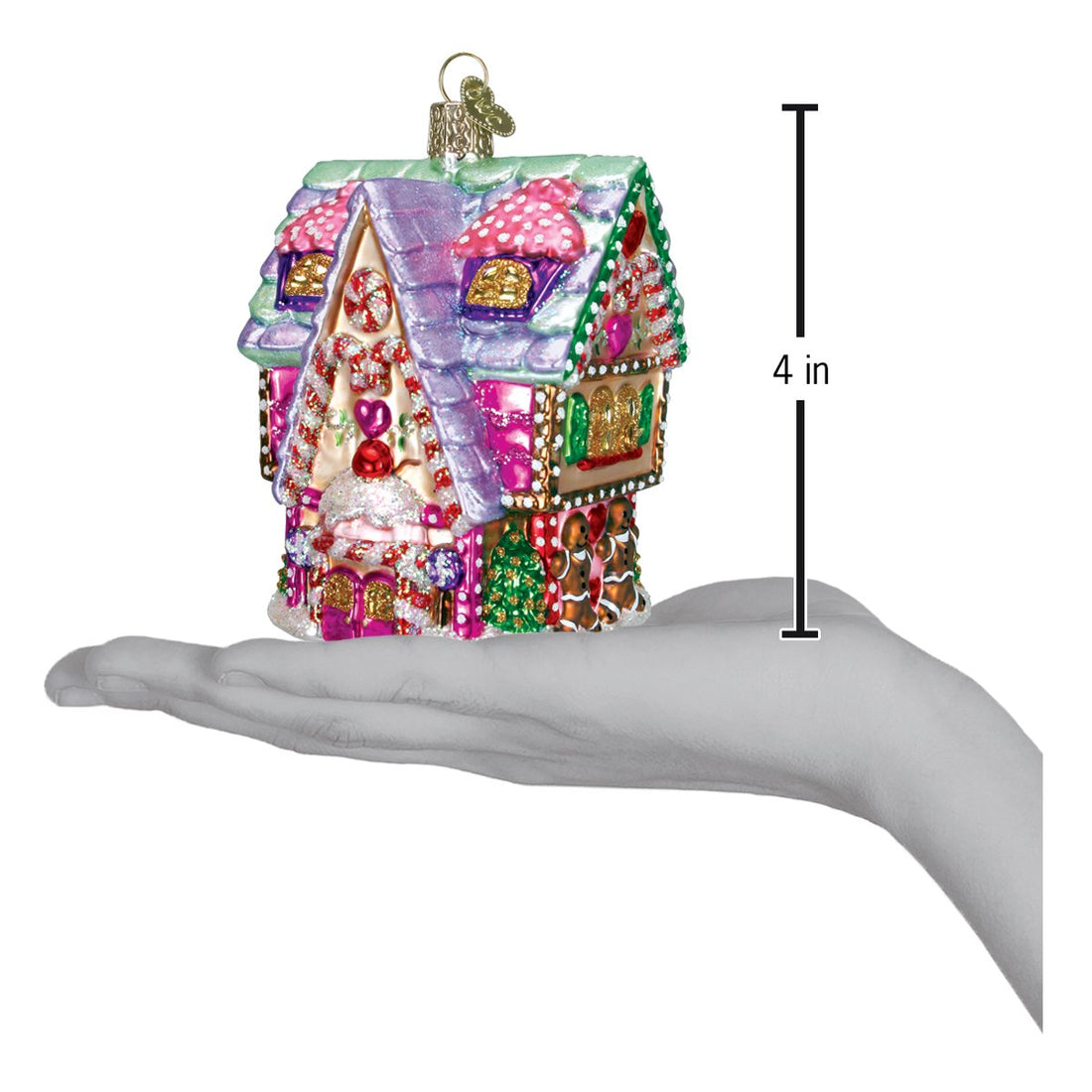 Cupcake Cottage glass ornament held in a hand, measuring 4 inches tall with colorful candy details.