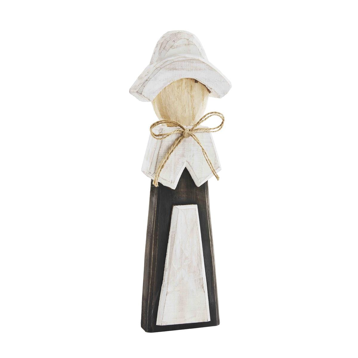 Hand-painted pine wood Pilgrim Sitter figurine with distressed chiseled texture and natural finish.