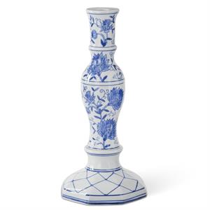 Blue and white ceramic taper candleholders with chinoiserie floral patterns.