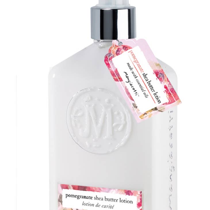 Pomegranate Shea Butter lotion bottle with a white label featuring pomegranate imagery and text.