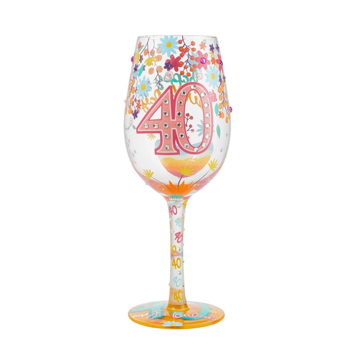 Blown glass wine glass with hand-painted floral designs, glitter accents, and a cocktail recipe printed on the base.