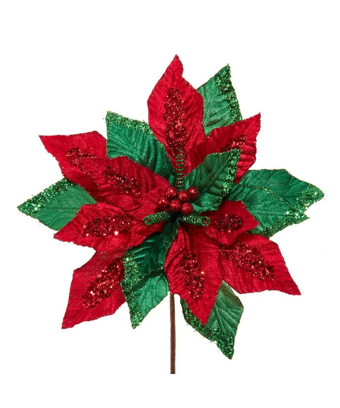 Red and green velvet poinsettia pick with glitter accents and a brown stem.