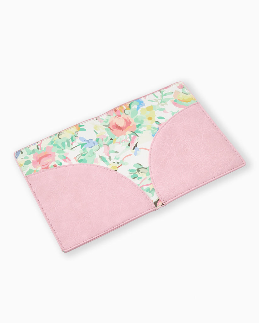 Open light pink mahjong card folio with floral interior and two curved pockets.